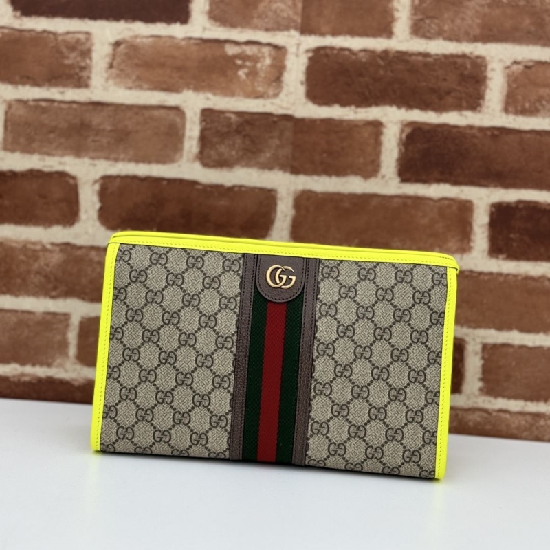 G*u*i clutch bags